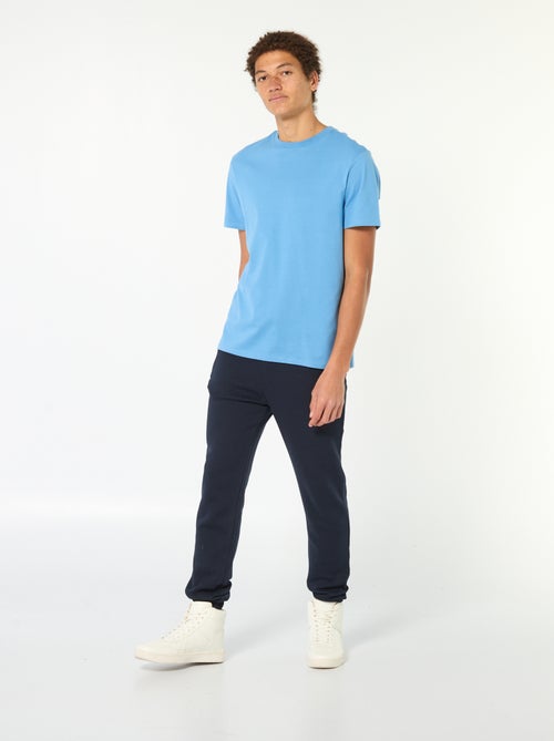 Jogging en molleton gratté avec 2 poches zippées - Kiabi