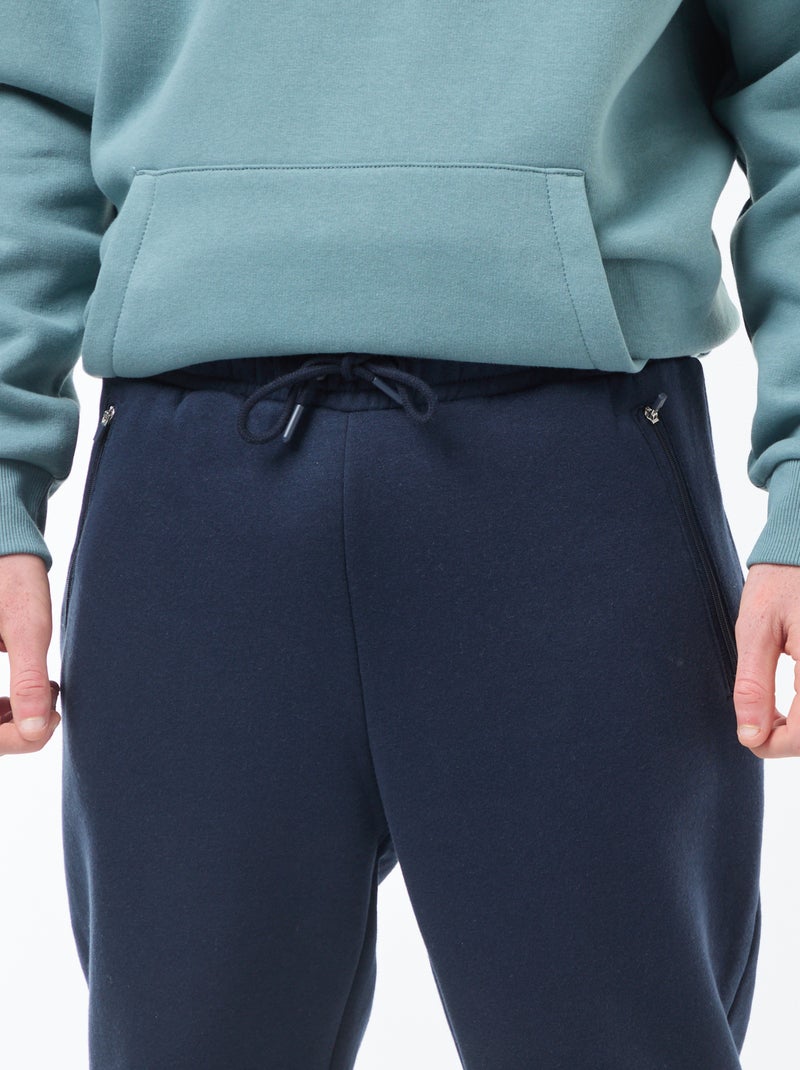 Jogging en molleton gratté avec 2 poches zippées - Bleu marine - Ado