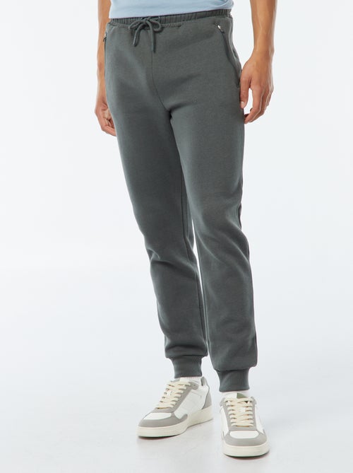 Jogging en molleton gratté avec 2 poches zippées - Kiabi