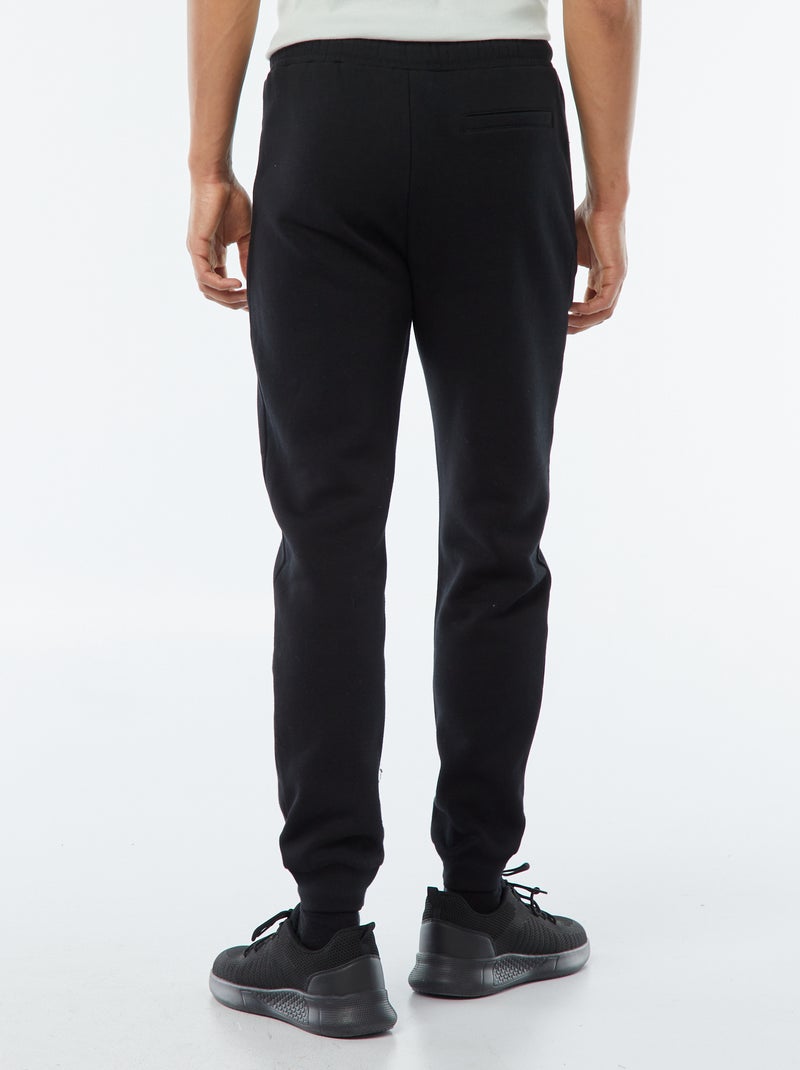 Jogging en molleton gratté avec 2 poches zippées Noir - Kiabi