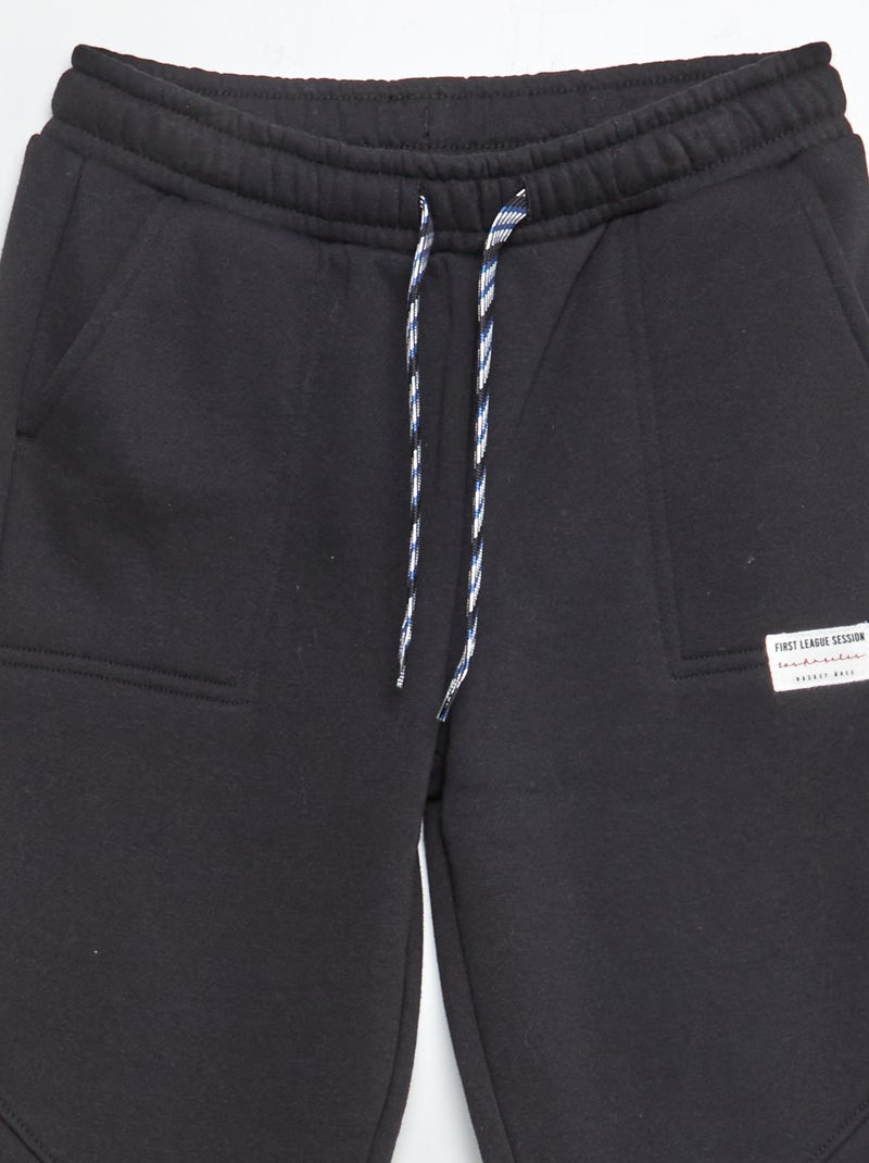 Jogging en molleton noir - Kiabi