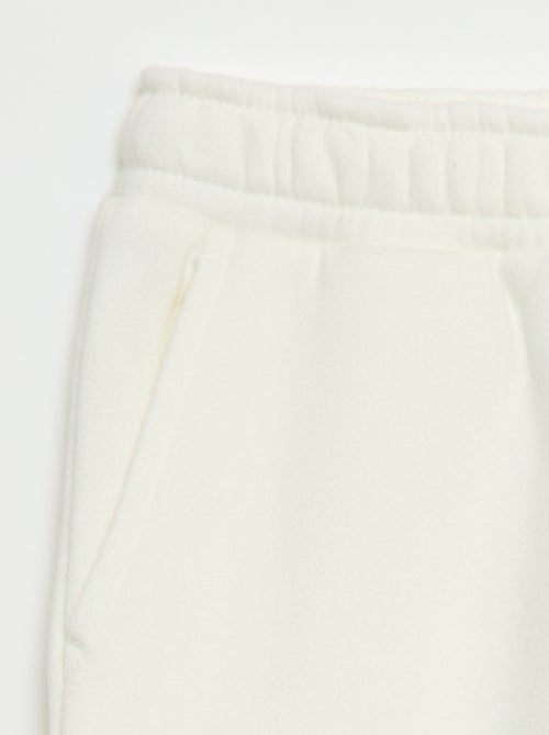 Jogging en molleton uni multi-poches - Kiabi Jogging en molleton uni multi-poches - Kiabi