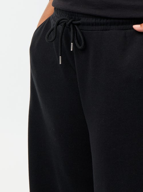 Jogging large uni - Kiabi Jogging large uni - Kiabi