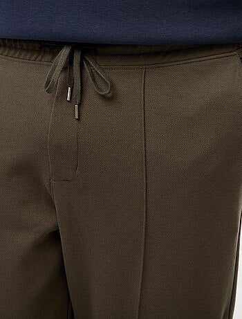 Jogging uni en maille piquée