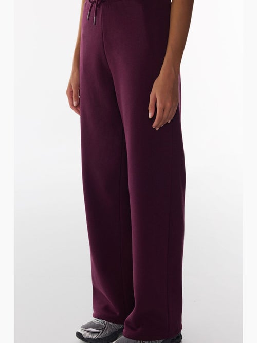 Joggingbroek met verstelbare taille en wijde pijp penti - Kiabi Joggingbroek met verstelbare taille en wijde pijp penti - Kiabi