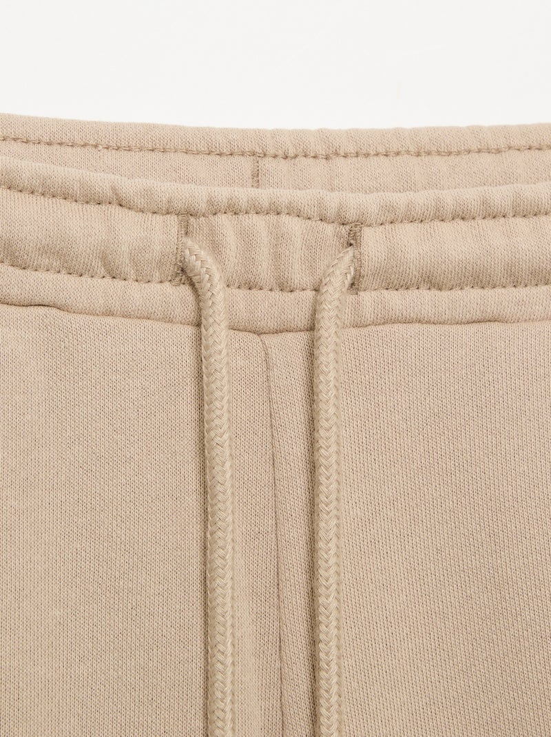 Joggingbroek van lichte molton met wijde pasvorm - gemakkelijk aan te trekken Biege - Kiabi