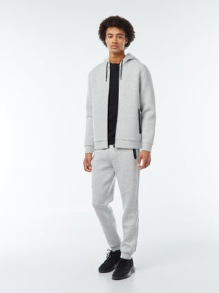 Joggingbroek van neopreenachtige sweatstof met zakken met ritsje