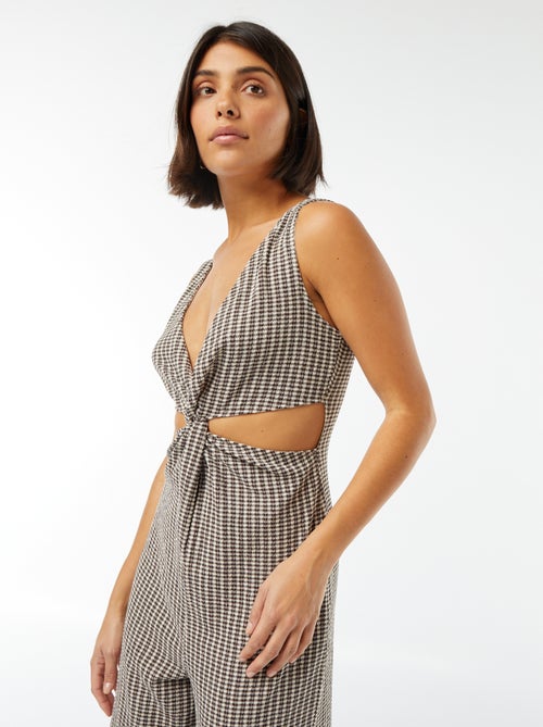 Jumpsuit met leuke strik en opengewerkte details - Kiabi
