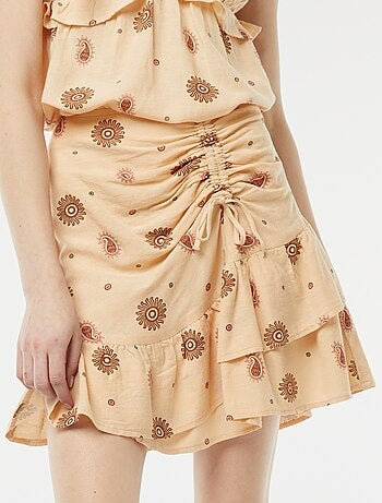 Jupe courte avec base volantée à étages