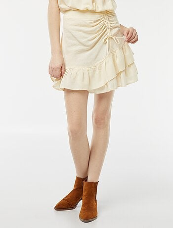 Jupe courte avec base volantée à étages