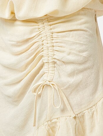 Jupe courte avec base volantée à étages