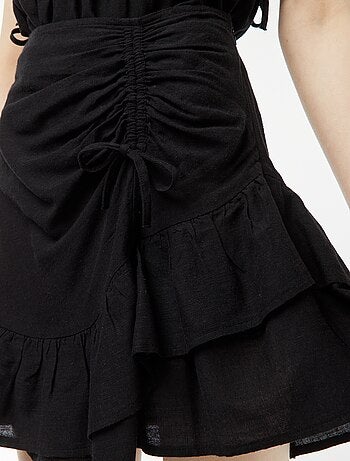 Jupe courte avec base volantée à étages