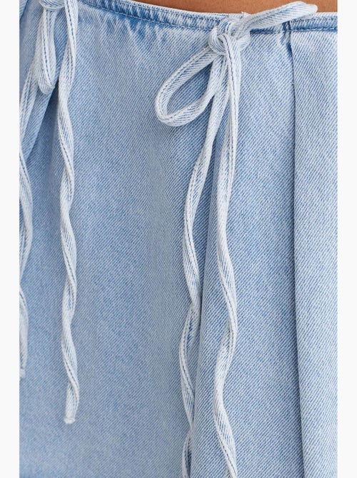 Jupe courte en denim de coton, coupe trapèze, nœud dilvin - Kiabi