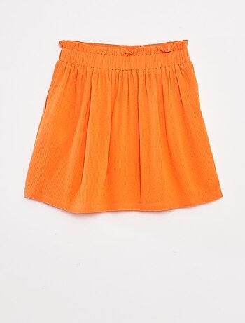 Jupe courte en matière crêpée