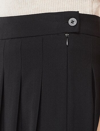 Jupe courte plissée