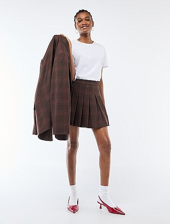 Jupe courte plissée zippée