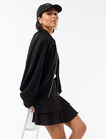 Jupe courte volantée en maille crinckle