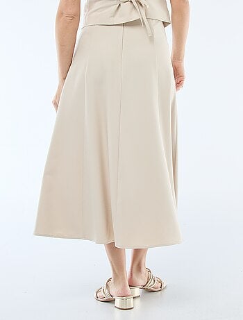 Jupe midi à pinces évasée