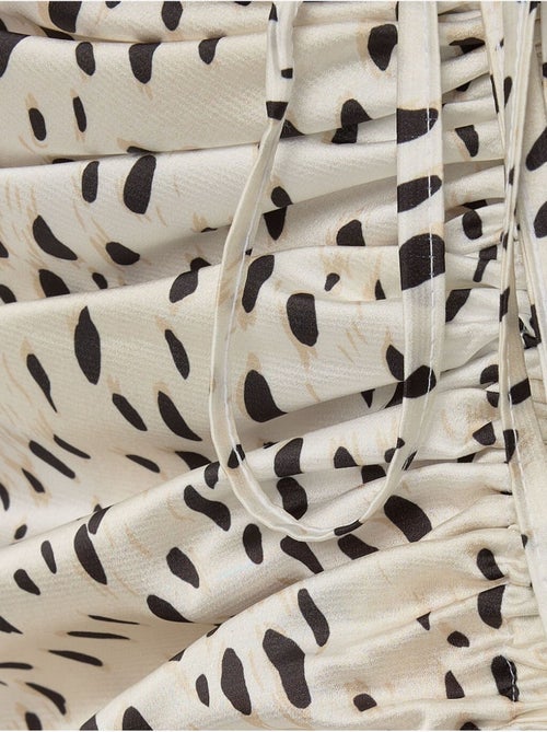 Jupe midi moulante en satin imprimé avec fente - Kiabi Jupe midi moulante en satin imprimé avec fente - Kiabi