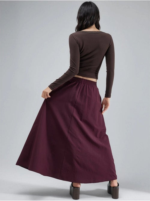 Jupe midi taille haute avec élastique busem - Kiabi Jupe midi taille haute avec élastique busem - Kiabi