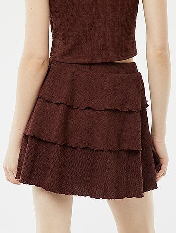 Jupe short courte en matière gaufrée