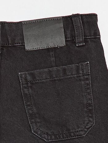 Jupe short en denim plissé