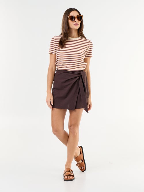 Jupe short léger avec ceinture à nouer - Kiabi Jupe short léger avec ceinture à nouer - Kiabi