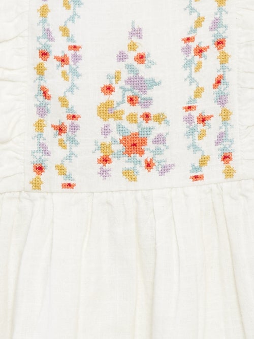 Jurk van grofgeweven stof met borduursel - Kiabi