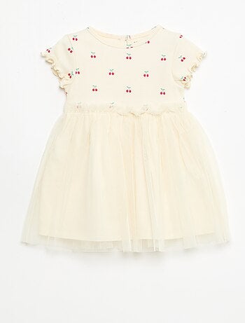 Jurk van ribgebreide stof en tule