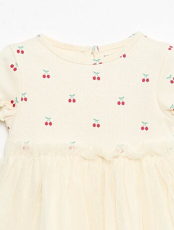 Jurk van ribgebreide stof en tule