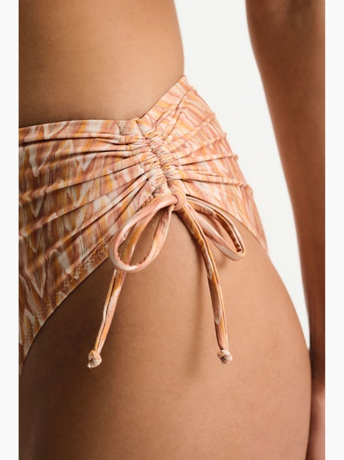 Kacie bikinibroekje met zigzagprint en hoge taille penti - Kiabi Kacie bikinibroekje met zigzagprint en hoge taille penti - Kiabi