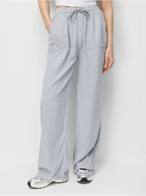 Katoenen broek met middelhoge taille, rechte pijpen en striksluiting mixray - Kiabi Katoenen broek met middelhoge taille, rechte pijpen en striksluiting mixray - Kiabi