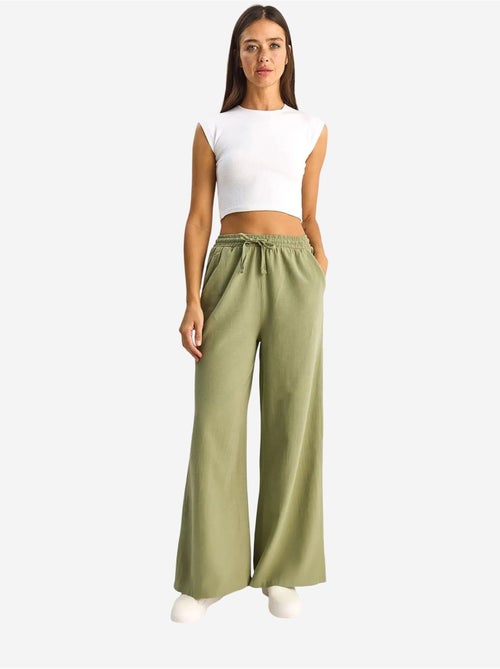 Katoenen broek met wijde pijpen en koord in de taille lucci - Kiabi Katoenen broek met wijde pijpen en koord in de taille lucci - Kiabi