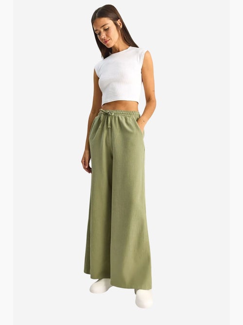Katoenen broek met wijde pijpen en koord in de taille lucci - Kiabi Katoenen broek met wijde pijpen en koord in de taille lucci - Kiabi