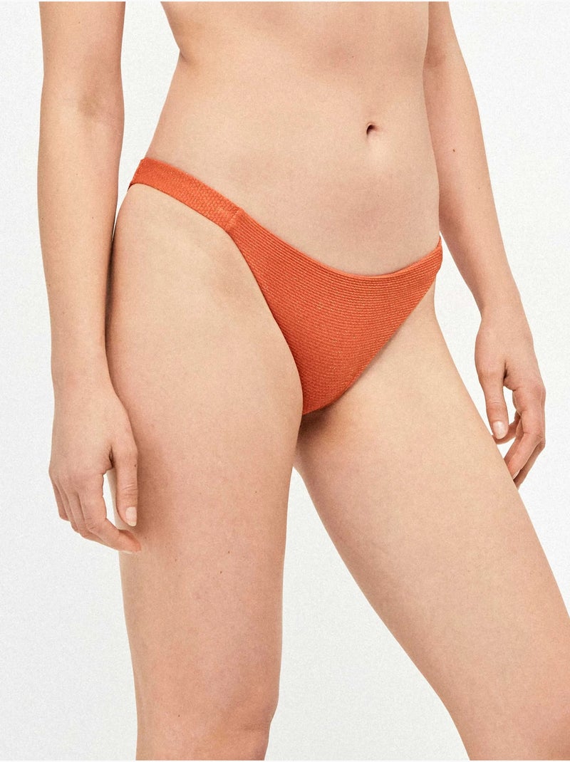 Klassiek bikinibroekje van stof met structuur, lurex en rimpeling aan de zijkanten. Terracotta - Kiabi