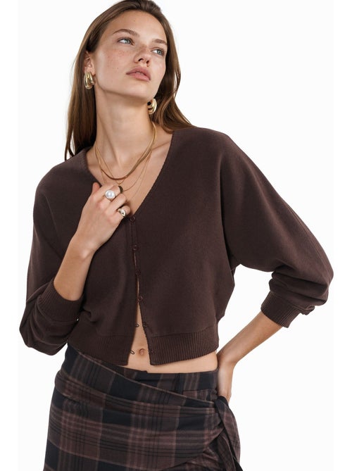 Kort geribd vest met v-hals busem - Kiabi Kort geribd vest met v-hals busem - Kiabi