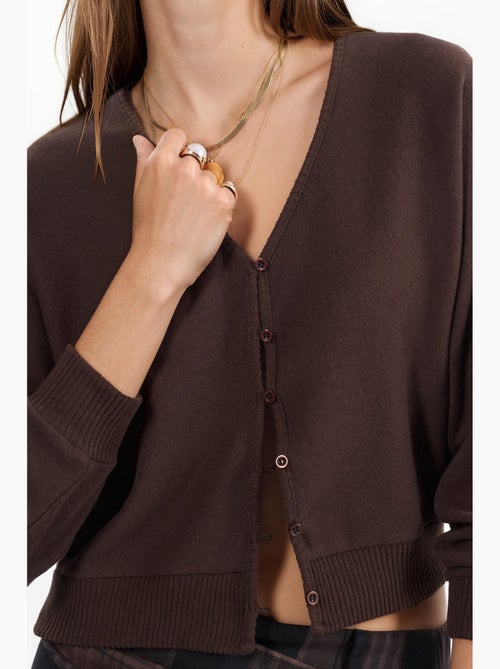 Kort geribd vest met v-hals busem - Kiabi Kort geribd vest met v-hals busem - Kiabi