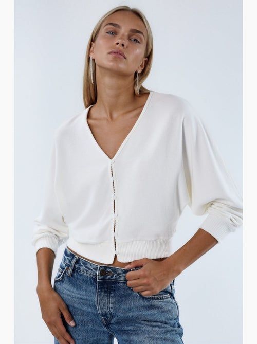 Kort geribd vest met v-hals busem - Kiabi Kort geribd vest met v-hals busem - Kiabi