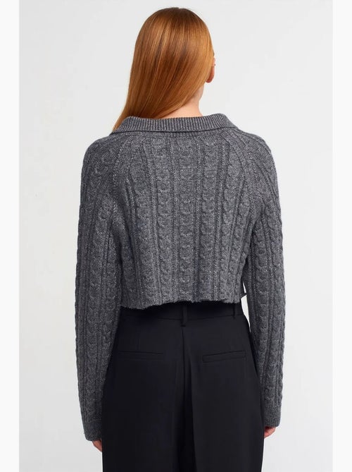 Kort kabelgebreid vest met knopen dilvin - Kiabi Kort kabelgebreid vest met knopen dilvin - Kiabi