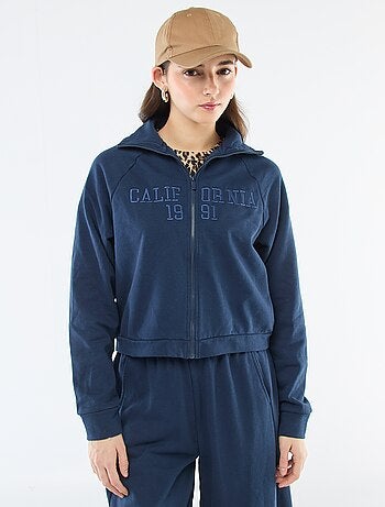 Kort sweatshirt met rits en geborduurde boodschap