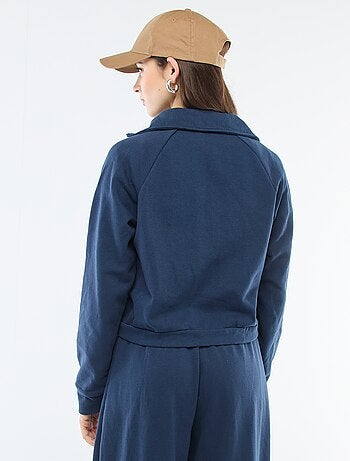 Kort sweatshirt met rits en geborduurde boodschap