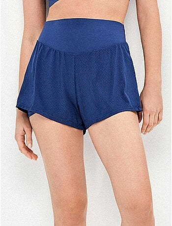 Korte blauwe broek met shorts aan de binnenkant