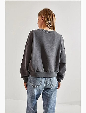 Korte katoenen sweater met ronde hals en tekstprint op de voorkant. Lucci