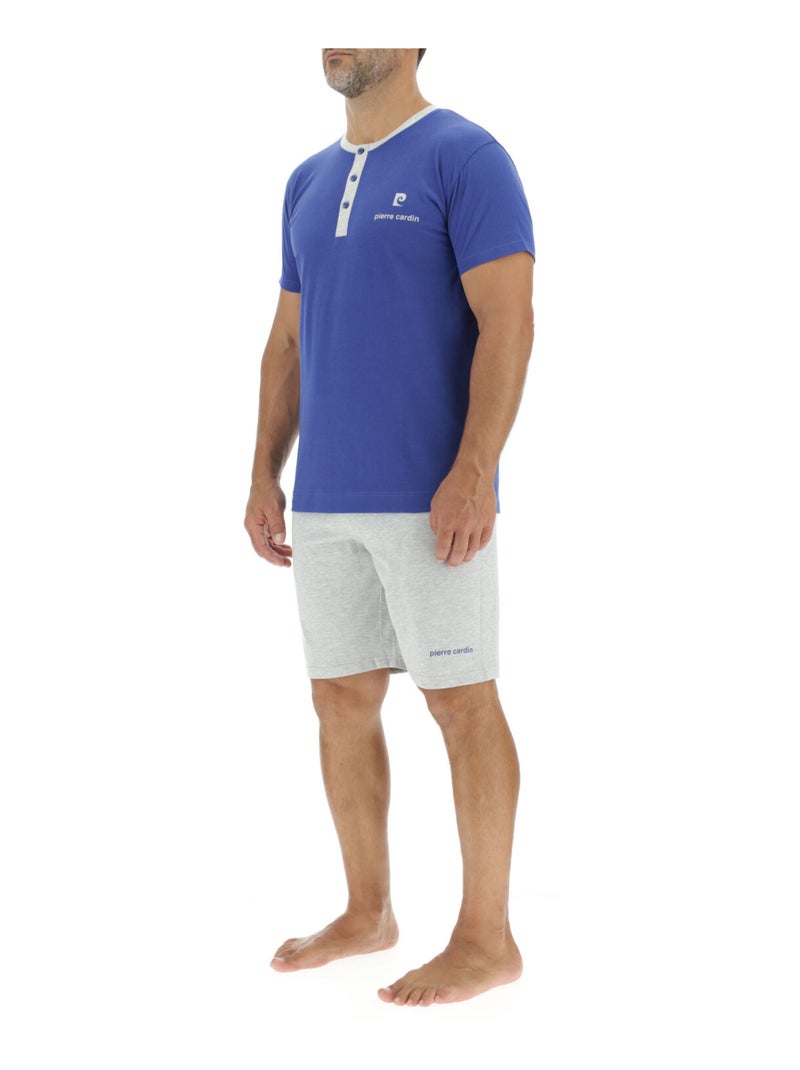 Korte pyjamaset voor heren van effen katoen met button-down kraag en logo op de borst. Blauw - Kiabi