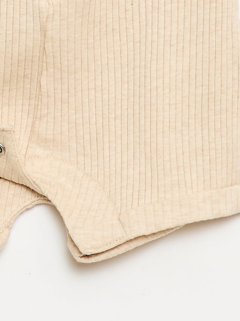 Korte ribgebreide romper Biege - Kiabi