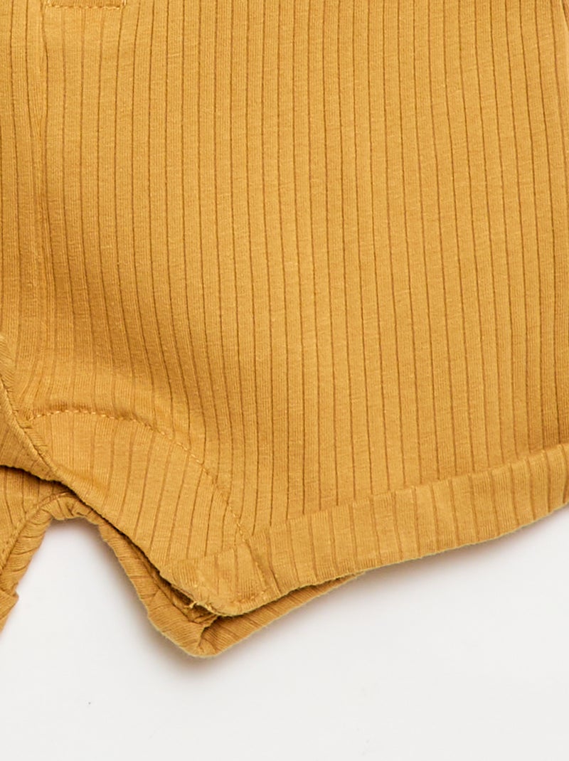 Korte ribgebreide romper Mosterdgeel - Kiabi