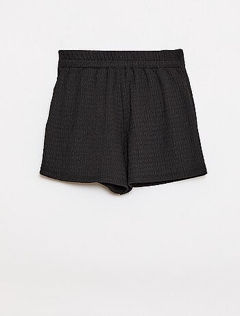 Korte rok-short van lichte effen tricot