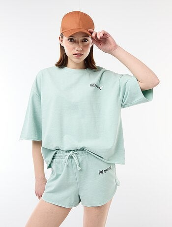 Korte short van french terry met opschrift