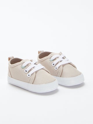 Lage sneakers met veters