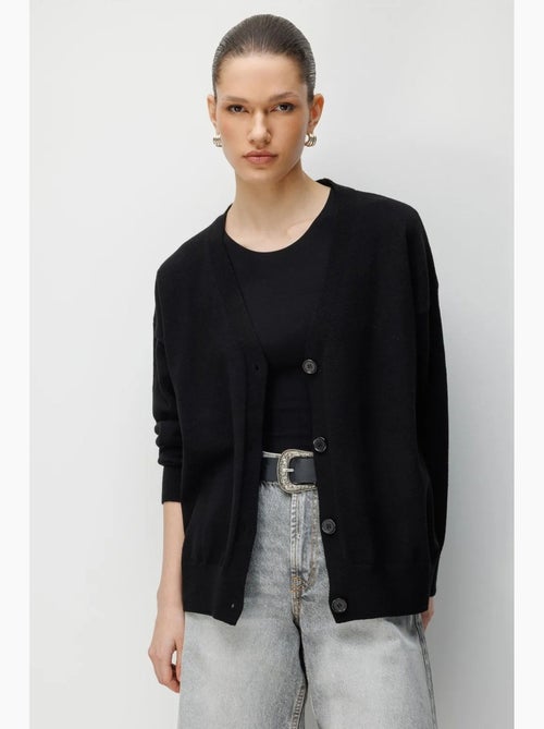 Lang geribd gebreid vest met v-hals en knoopsluiting mixray - Kiabi Lang geribd gebreid vest met v-hals en knoopsluiting mixray - Kiabi